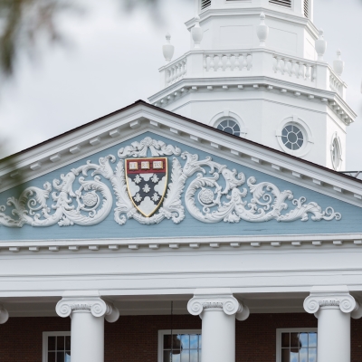 Baker Library front exterior with HBS shield